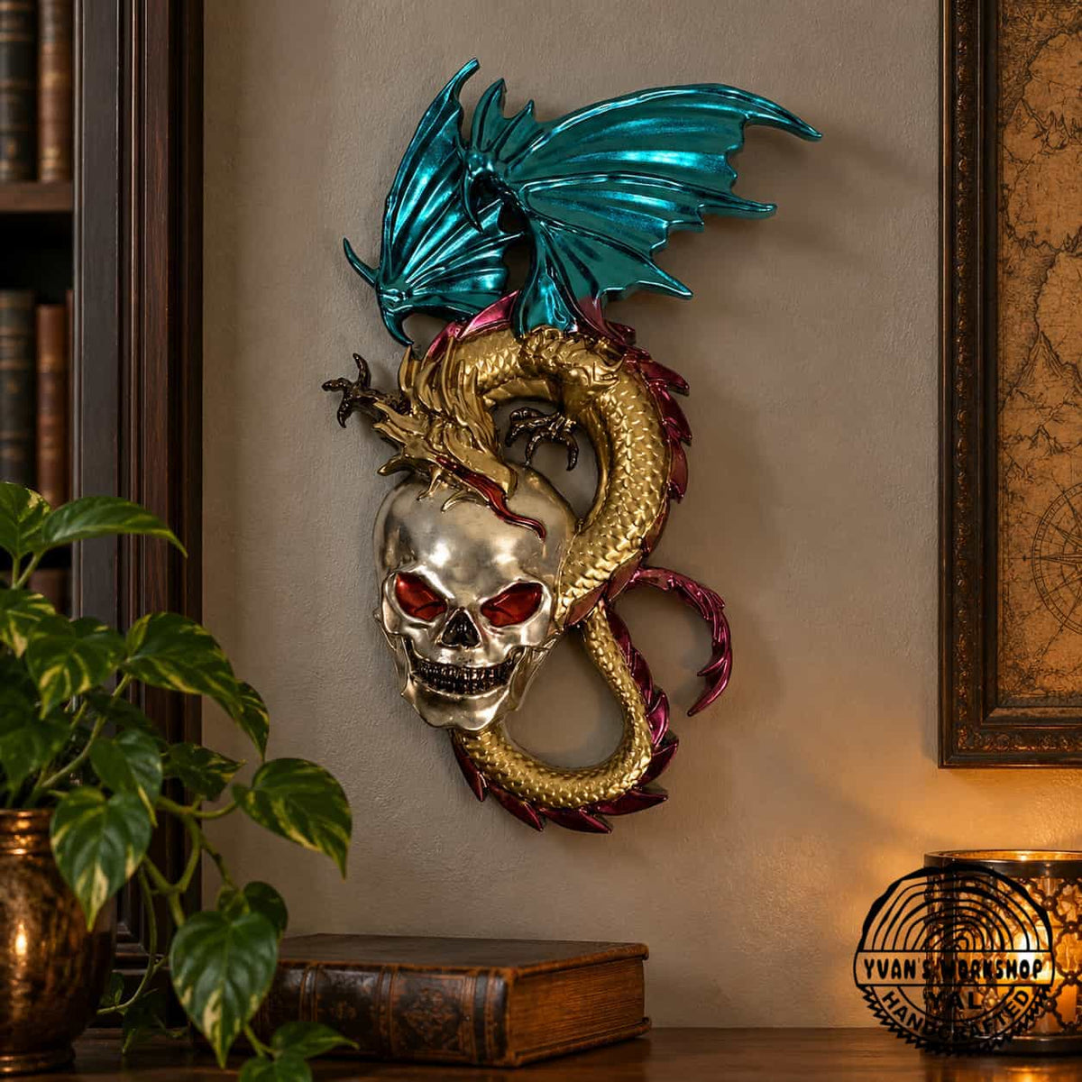 Teal-winged gold dragon curled around a silver skull with magenta accents