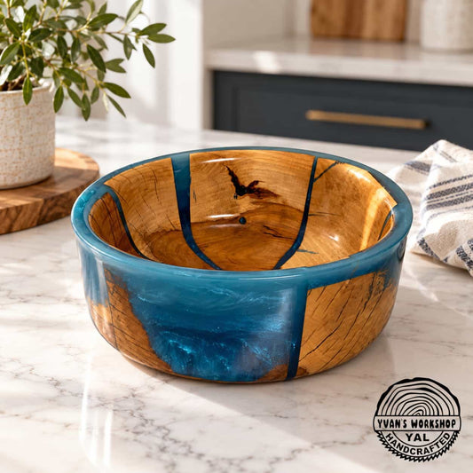 Natural apple wood bowl with blue epoxy sections and smooth turned rim