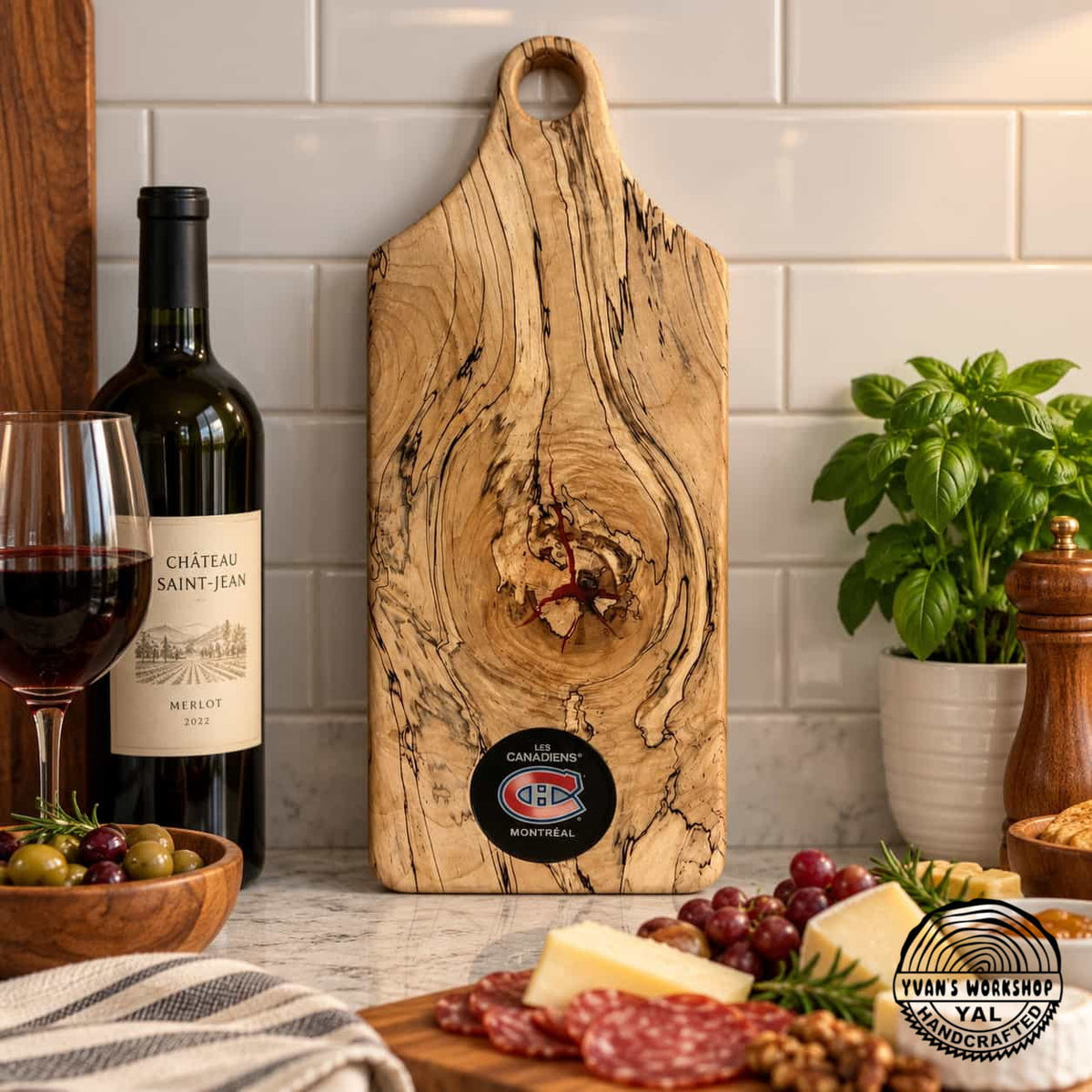 Spalted maple hockey puck serving board displayed in a kitchen
